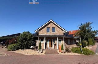 Einfamilienhaus kaufen in 49688 Lastrup, Modernes Einfamilienhaus mit Doppelgarage, PV-Anlage, Sauna und idyllischem Garten