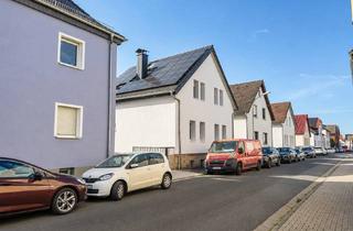 Mehrfamilienhaus kaufen in 63110 Rodgau, Renditestark und bezugsfertig: Modernisiertes Mehrfamilienhaus für Kapitalanleger und Selbstnutzer