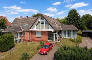 Haus kaufen in 24229 Schwedeneck, Großzügiges Zweiparteienhaus in Feldrandlage nahe der Ostsee in Schwedeneck