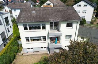 Haus kaufen in 60388 Bergen-Enkheim, Freistehendes Zweifamilienhaus mit Garten und Garage – tolles Zuhause mit vielfältigen Möglichkeiten
