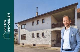 Haus kaufen in 91083 Baiersdorf, Sanierungsbedürftiges Zweifamilienhaus mit Garten, Balkon & Garagen