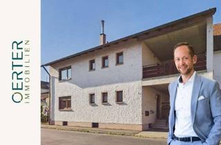 Haus kaufen in 91083 Baiersdorf, Sanierungsbedürftiges Zweifamilienhaus mit Garten, Balkon & Garagen