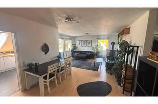 Wohnung kaufen in Karlsbaderstraße 11-13, 35428 Langgöns, Wohnen mit Ausblick: 4-Zimmer-Dachgeschosswohnung in Langgöns-Niederkleen