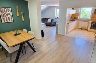 Wohnung kaufen in 96486 Lautertal, Modernes Wohlfühljuwel mit Garage und Garten!
