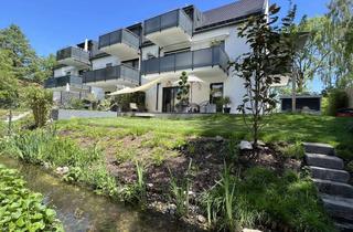 Wohnung kaufen in Münchner Straße 43, 85757 Karlsfeld, Luxus 3 Zimmer Wohnung mit Schwaigerbach durch den Garten