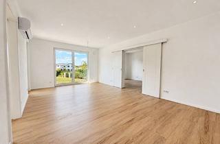 Wohnung kaufen in 84577 Tüßling, Exklusiv ausgestattete 5-Zimmerwohnung mit hochwertiger Küche, drei Bädern und zwei Balkonen