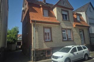 Mehrfamilienhaus kaufen in 63456 Hanau, Voll vermietetes Mehrfamilienhaus mit zusätzlichem Entwicklungspotenzial in Hanau-Steinheim