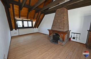 Wohnung kaufen in 46446 Emmerich, Charmante Dachgeschosswohnung mit historischem Charme und modernisiertem Wohnkomfort in Emmerich