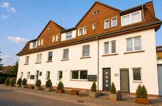 Mehrfamilienhaus kaufen in Landheim, 33649 Brackwede, Mehrfamilienhaus mit Wohn- und Gewerbeeinheiten
