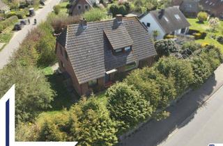 Einfamilienhaus kaufen in 24321 Behrensdorf, Einfamilienhaus mit ELW in 24321 Behrensdorf | Lütt Immobilien Kiel | Provisionsfrei für Kaufende
