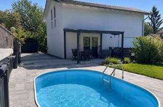 Haus kaufen in 61130 Nidderau, Nidderau-Ostheim: 3-Familienhaus mit großem Pool und viel Potenzial