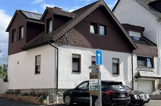 Haus kaufen in 61381 Friedrichsdorf, Viel Platz zum Wohnen: Gepflegtes Zweifamilienhaus mit 9 Zimmern und großem Grundstück in Köppern