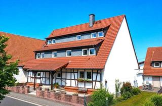Doppelhaushälfte kaufen in 63674 Altenstadt, Doppelhaushälfte mit besonderem Charme - Fachwerk und Backstein harmonisch vereint