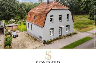 Haus kaufen in 47551 Bedburg-Hau, Viel Raum für individuelle Lebensentwürfe – Zweifamilienhaus mit großem Grundstück in Bedburg-Hau