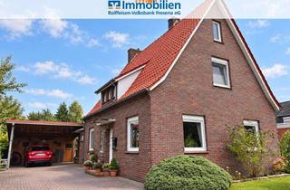 Einfamilienhaus kaufen in 26624 Südbrookmerland, Einfamilienhaus in zentraler Lage mit Blick ins Grüne