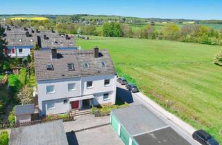 Doppelhaushälfte kaufen in 65232 Taunusstein, Doppelhaushälfte mit großzügigem Grundriss, Garage und Traumblick in Taunusstein-Wehen