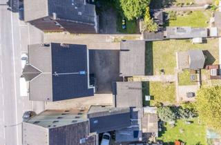 Mehrfamilienhaus kaufen in 44388 Bövinghausen, SOLL-Faktor 12! Laufend modernisiertes Mehrfamilienhaus mit 5 Garagen & Mietpotenzial