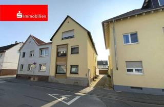 Haus kaufen in 64319 Pfungstadt, Gepflegtes Dreifamilienhaus mit vier Garagen und Garten