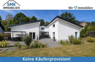 Einfamilienhaus kaufen in 33758 Schloß Holte-Stukenbrock, Architektur trifft Natur – moderner Bungalow auf großzügigem Grundstück in Stukenbrock