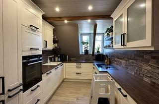 Wohnung kaufen in 21376 Garlstorf, Maisonette-Wohnung in großzügigem Wohnquartier mit historischem Hintergrund-Wohnen im Milchkontor-