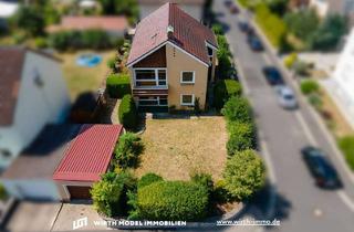Einfamilienhaus kaufen in 97464 Niederwerrn, Freistehendes Einfamilienhaus mit Garage in zentraler Lage von Niederwerrn