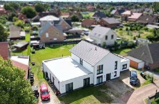 Haus kaufen in 29356 Bröckel, Neuwertiges Dreifamilienhaus auf 1.356 m² – Wohnen, Vermieten & weitere Bebauung möglich