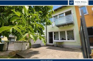 Haus kaufen in 91083 Baiersdorf, Charmantes Reiheneckhaus mit Garten und Potenzial