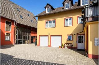 Haus kaufen in 61381 Friedrichsdorf, Investment mit Perspektive: Saniertes 7-Parteien-Ensemble mit Ausbaupotenzial