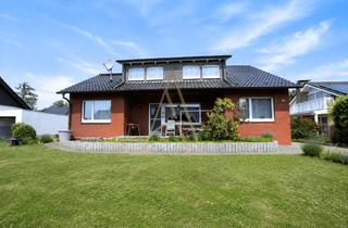 Haus kaufen in 33803 Steinhagen, Ein Haus, viele Möglichkeiten: Großzügiges Wohnen für die ganze Familie in Steinhagen
