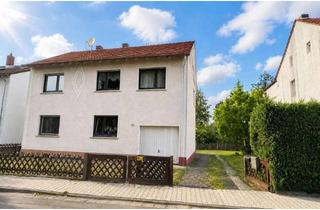 Haus kaufen in 63533 Mainhausen, Zweifamilienhaus mit großem Grundstück – viel Platz für Ihre Ideen und handwerkliches Geschick