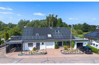 Haus kaufen in 24783 Osterrönfeld, Modernes und energieeffizientes Wohnen mit Kanalblick