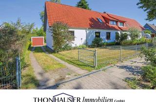 Doppelhaushälfte kaufen in 23843 Bad Oldesloe, Doppelhaushälfte in 23843 Bad Oldesloe mit großzügigem Grundstück, Garage und Carport