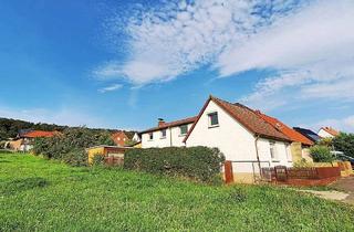Anlageobjekt in 31089 Duingen, Mit Blick auf das Leinebergland! Renovierte Doppelhaushälfte inklusive Garage und Garten in Duingen