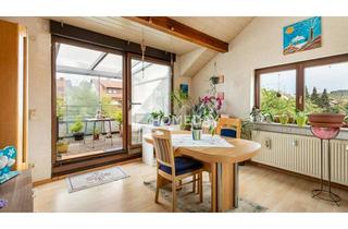 Wohnung kaufen in 76703 Kraichtal, Gemütlich über den Dächern: 92 m² DG-Wohnung mit Wintergarten & Kamin