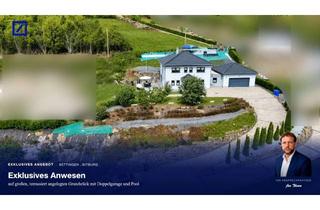 Haus kaufen in 54646 Bettingen, Exklusives energieeffizientes Anwesen auf großem terrassiert angelegten Grundstück mit Doppelgarage