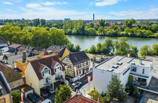 Haus kaufen in 65451 Kelsterbach, ZUHAUSE AM WASSER – Historisches Wohnhaus mit 195 m² Wfl. direkt am Main