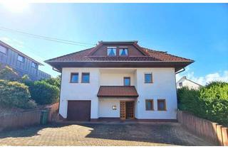 Einfamilienhaus kaufen in 56244 Freirachdorf, Großzügiges, freistehendes Einfamilienhaus mit sonnigem Garten und Garage