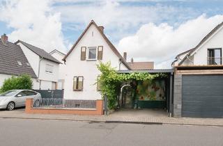 Einfamilienhaus kaufen in 67105 Schifferstadt, Haus in zweiter Baureihe mit kleinem Garten, Carport & Garage