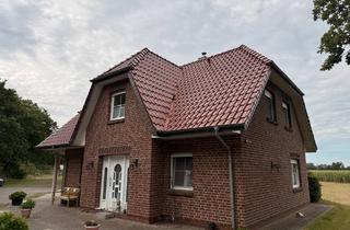 Haus kaufen in 26180 Rastede, Ländliches Wohnhaus mit Halle in schöner Randlage in Rastede-Bekhausen