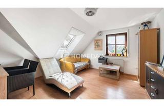 Wohnung kaufen in 86633 Neuburg, Drei Zimmer unterm Dach: Vermietete Wohnung mit Balkon und Tiefgarage