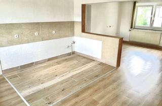 Wohnung kaufen in Bahnhofstraße 26, 04613 Lucka, Wohnen mit Charakter: 4-Zimmer-Wohnung in Lucka