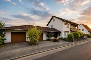 Haus kaufen in 66851 Queidersbach, Zweifamilienhaus mit Doppelgarage auf Eigentumsgrundstück in Queidersbach
