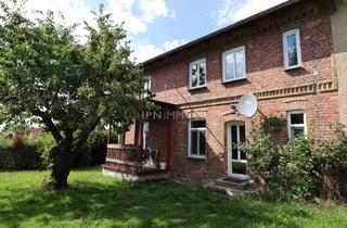 Mehrfamilienhaus kaufen in 18190 Sanitz, Mehrfamilienhaus mit 3 WE und Garagen in Sanitz
