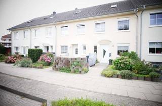 Haus kaufen in 23966 Friedenshof, Reihenmittelhaus mit genügend Platz, Wintergarten, Balkon, Kamin und PKW-Stellplatz!