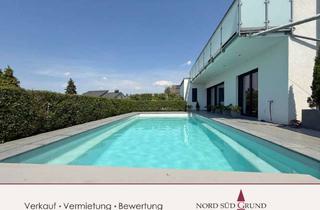 Haus kaufen in 76456 Kuppenheim, Bauhaus-Design trifft modernste Haustechnik! Pool, Fernsicht. 692 m² Grundstück, 1.238 m² Wiese.