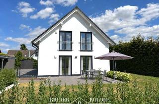 Einfamilienhaus kaufen in 32469 Petershagen, Neuwertiges Einfamilienhaus aus dem Baujahr 2020 mit Wohlfühlgarten in Windheim