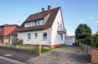Haus kaufen in 32429 Minden, Freistehendes Zweifamilienhaus mit großem Grundstück und Garage
