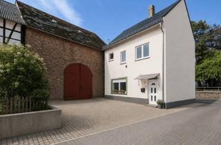 Haus kaufen in 56357 Niederwallmenach, Sanierungsobjekt mit Potenzial im Zentrum von Niederwallmenach