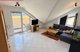 Wohnung kaufen in 63579 Freigericht, 2-Zimmer-Dachgeschosswohnung mit Balkon und Feldblick in Freigericht-Somborn
