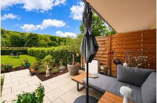 Wohnung kaufen in 35423 Lich, Einziehen & genießen – neuwertige Gartenwohnung mit 160 m² Privatgarten am Golfplatz